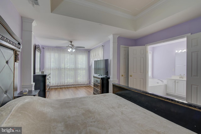 43855 Tattinger Ter, Ashburn, VA 20148 - bedroom featuring ornate columns, ornamental molding, wood finished floors, and ensuite bathroom