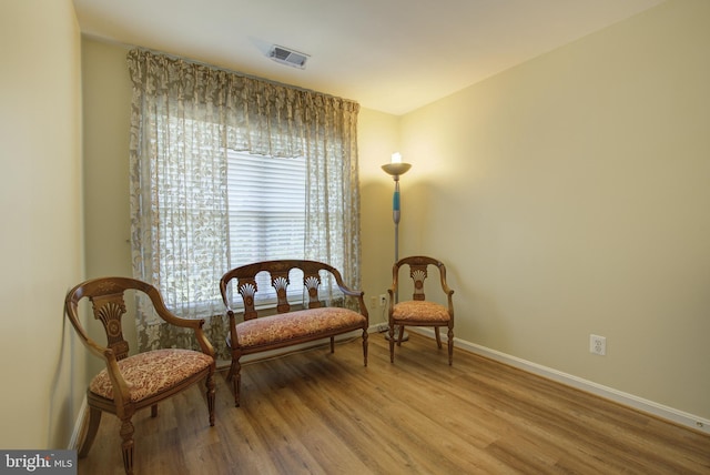 43855 Tattinger Ter, Ashburn, VA 20148 - living area with light wood-style floors and baseboards