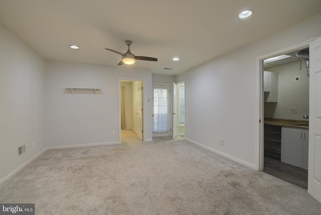 43855 Tattinger Ter, Ashburn, VA 20148 - unfurnished bedroom with light colored carpet, recessed lighting, and connected bathroom