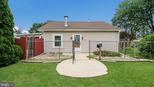 315 Leedom Ave, Bristol, PA 19007 - rear view of house with roof with shingles and a gate