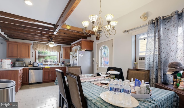 315 Leedom Ave, Bristol, PA 19007 - dining space featuring healthy amount of natural light, light tile patterned flooring, a ceiling fan, and a chandelier