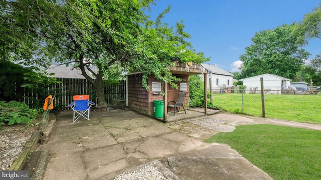 315 Leedom Ave, Bristol, PA 19007 - fenced backyard featuring a patio area and a storage shed
