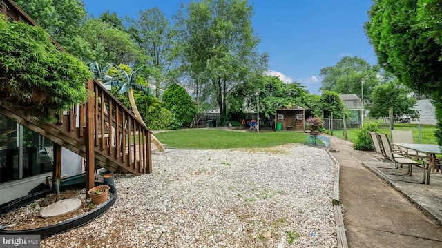 315 Leedom Ave, Bristol, PA 19007 - fenced backyard featuring a storage unit, a patio, and stairway