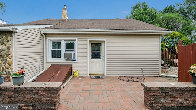 315 Leedom Ave, Bristol, PA 19007 - back of house featuring roof with shingles, a patio, and a chimney