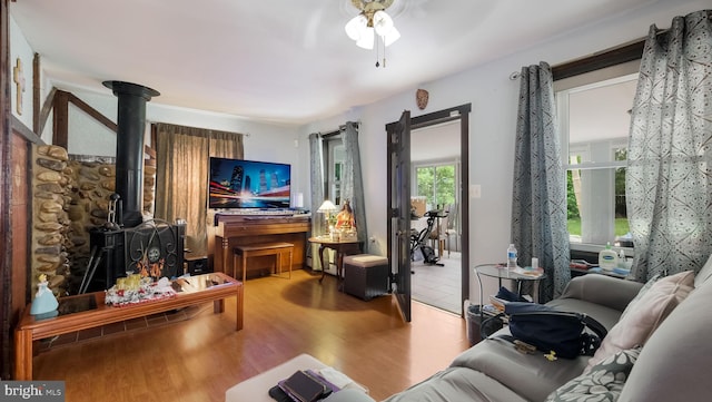 315 Leedom Ave, Bristol, PA 19007 - living room featuring a ceiling fan, wood finished floors, and a wood stove