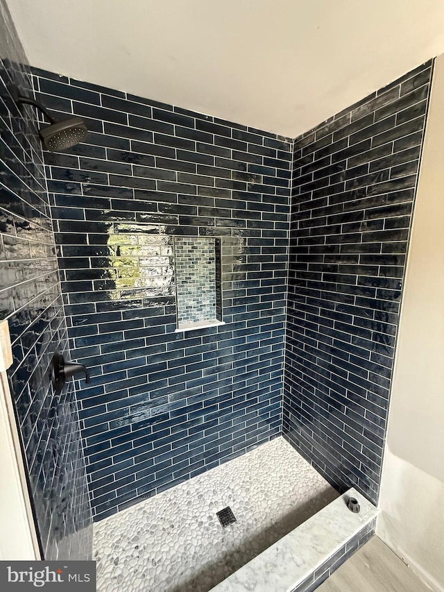 11 Cornwall Rd, Rehoboth Beach, DE 19971 - full bath featuring a tile shower and wood finished floors