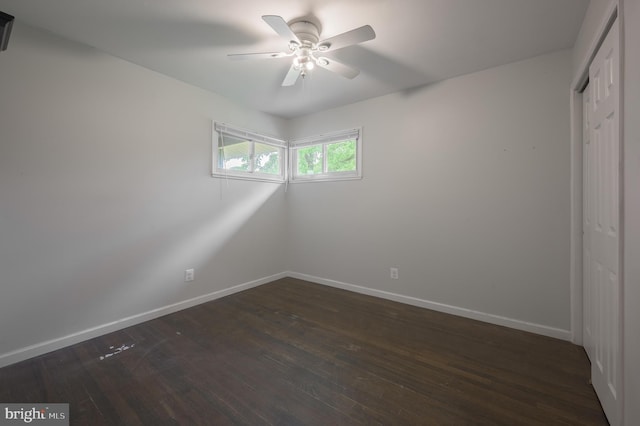 26 Hemlock Dr, Parlin, NJ 08859 - unfurnished bedroom featuring a closet, dark wood-type flooring, and a ceiling fan
