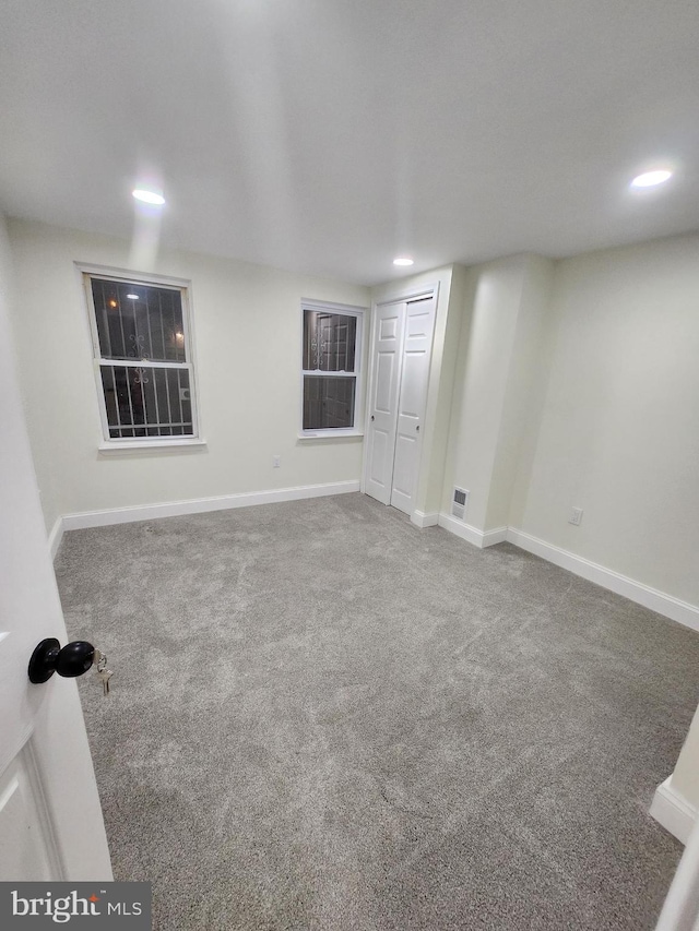 708 N Madeira St, Baltimore, MD 21205 - spare room featuring carpet flooring and recessed lighting