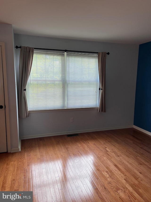 674 Honeysuckle Way, Pennsburg, PA 18073 - spare room with hardwood / wood-style flooring and baseboards