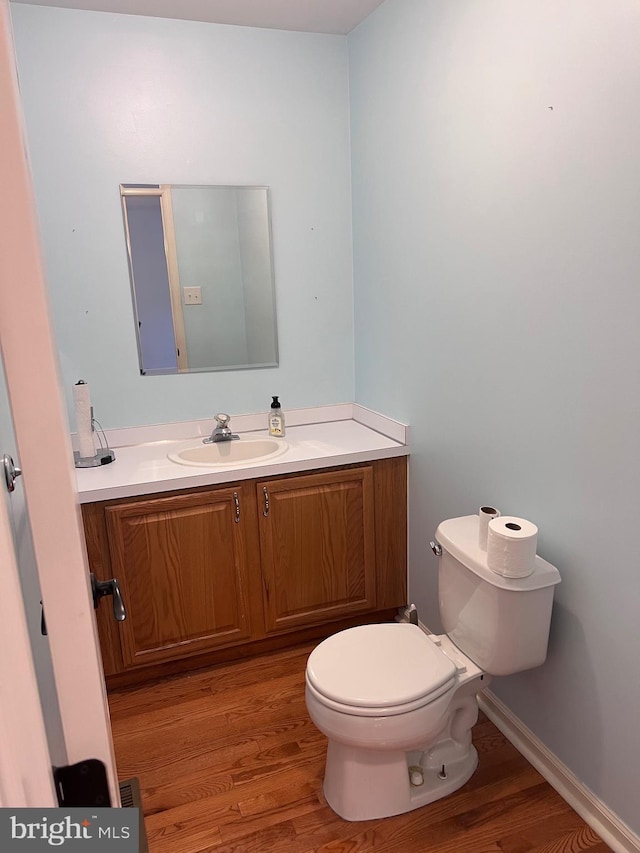 674 Honeysuckle Way, Pennsburg, PA 18073 - half bath with vanity and wood finished floors
