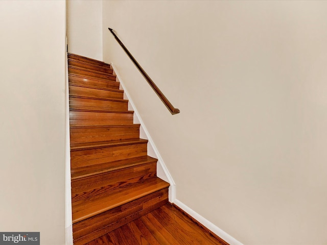 18040 Singing Pine Cir, Montgomery Village, MD 20886 - stairs with baseboards and wood finished floors