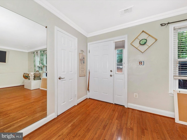 18040 Singing Pine Cir, Montgomery Village, MD 20886 - entryway with hardwood / wood-style flooring and ornamental molding