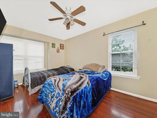18040 Singing Pine Cir, Montgomery Village, MD 20886 - bedroom featuring wood-type flooring and ceiling fan