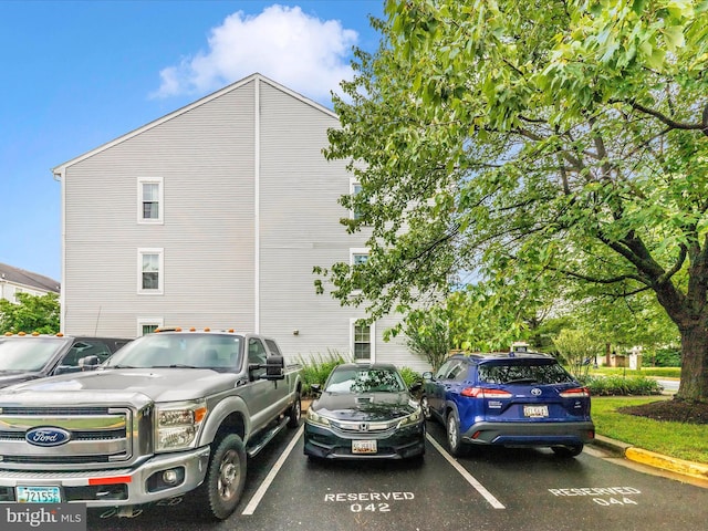 18040 Singing Pine Cir, Montgomery Village, MD 20886 - view of side of property featuring uncovered parking
