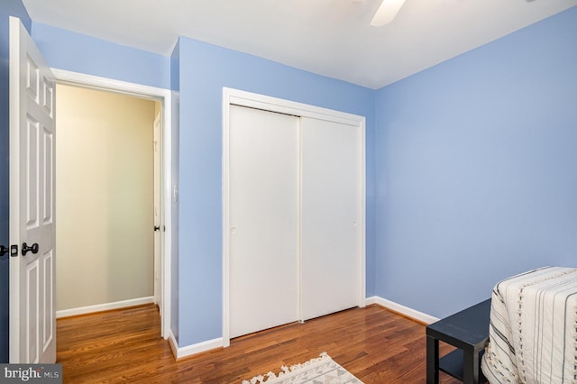 5917 Kingsford Rd Unit 366, Springfield, VA 22152 - bedroom with wood finished floors, a closet, and a ceiling fan