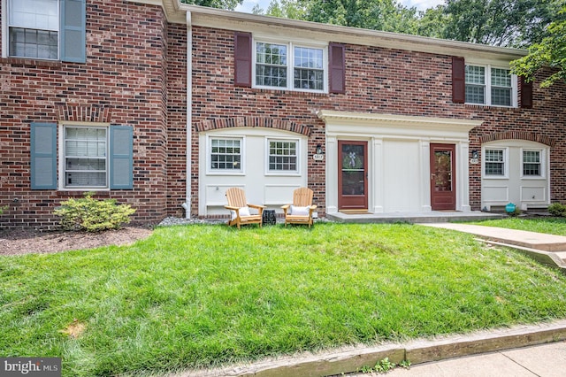 5917 Kingsford Rd Unit 366, Springfield, VA 22152 - townhome / multi-family property with a front lawn and brick siding