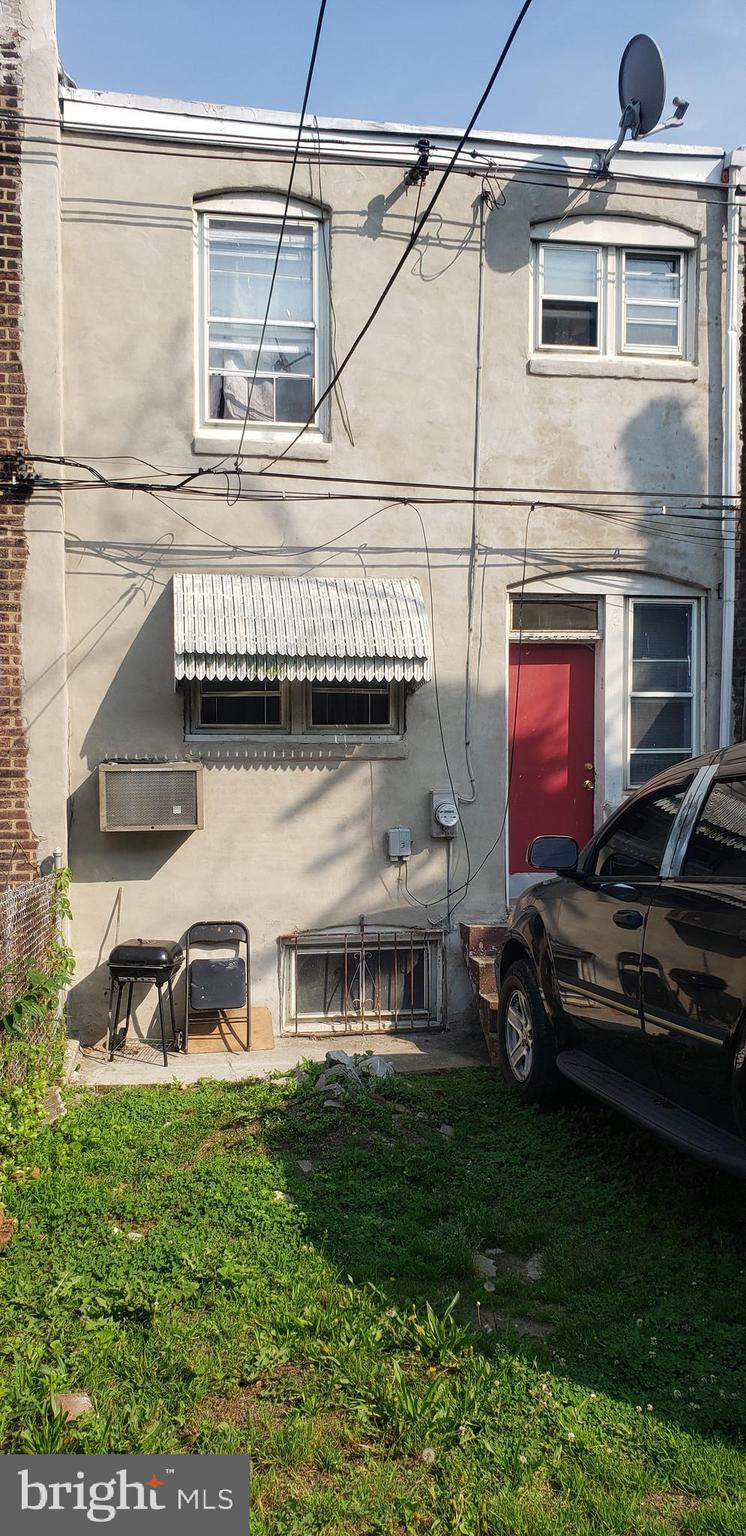 5705 Reedland St, Philadelphia, PA 19143 - view of side of property with stucco siding