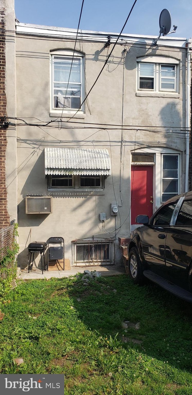 5705 Reedland St, Philadelphia, PA 19143 - view of side of property with stucco siding