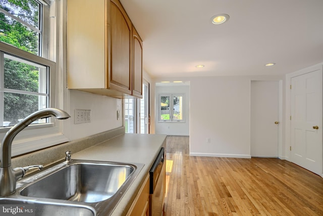 1720 Denton Ct, Crofton, MD 21114 - kitchen featuring stainless steel dishwasher, plenty of natural light, light wood finished floors, recessed lighting, and brown cabinetry