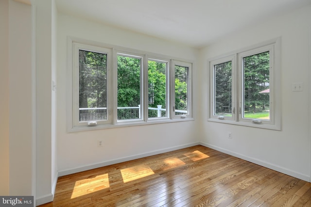 1720 Denton Ct, Crofton, MD 21114 - spare room featuring healthy amount of natural light and hardwood / wood-style floors
