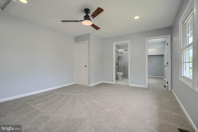 1720 Denton Ct, Crofton, MD 21114 - unfurnished bedroom with carpet, recessed lighting, a closet, ensuite bathroom, and a walk in closet