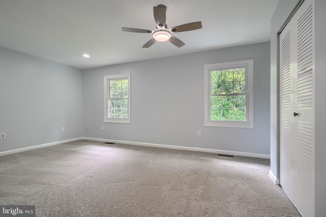 1720 Denton Ct, Crofton, MD 21114 - unfurnished bedroom featuring carpet, a closet, a ceiling fan, and recessed lighting
