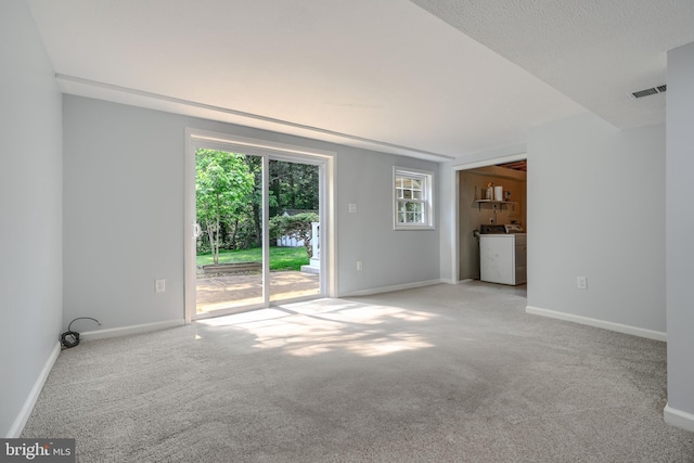 1720 Denton Ct, Crofton, MD 21114 - unfurnished living room with washer / clothes dryer and carpet flooring