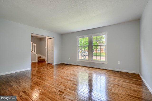 1720 Denton Ct, Crofton, MD 21114 - spare room with light wood-type flooring and stairway