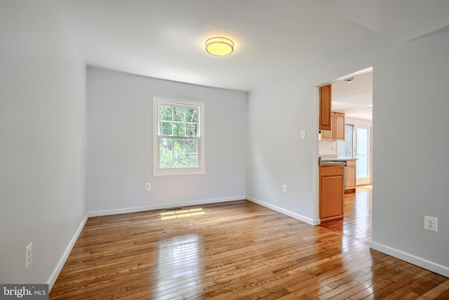 1720 Denton Ct, Crofton, MD 21114 - unfurnished room with light wood-type flooring and baseboards