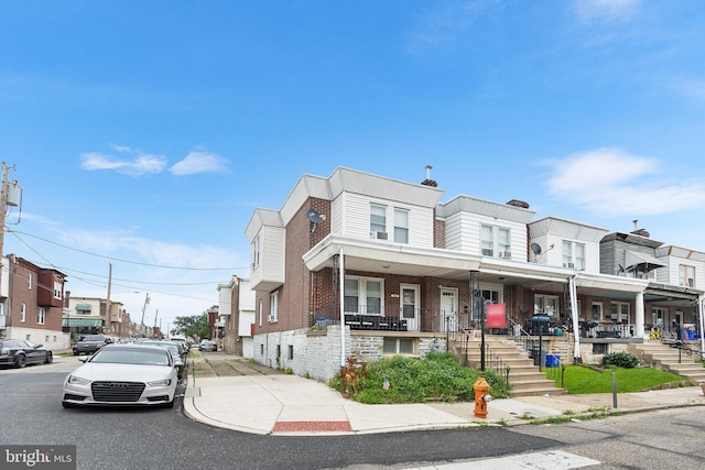4029 Creston St, Philadelphia, PA 19135 - multi unit property with a porch and brick siding