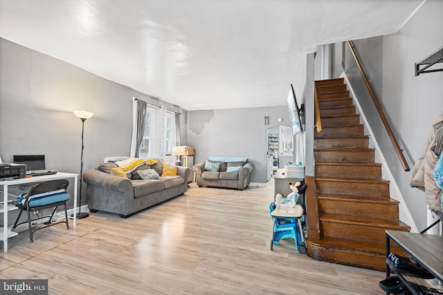 4029 Creston St, Philadelphia, PA 19135 - living area featuring wood finished floors and stairs