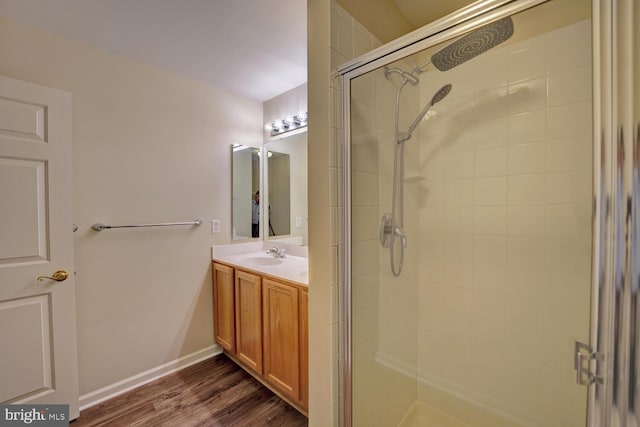 2 N Cummings Dr, Middletown, DE 19709 - bathroom featuring a shower stall, vanity, and wood finished floors