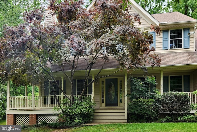 3689 N Carolina Ave, Edgewater, MD 21037 - view of front of house with a porch and a shingled roof