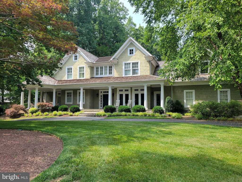 13311 Drews Ln, Potomac, MD 20854 - shingle-style home featuring a front lawn and covered porch