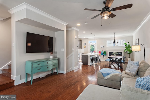 103 Norma Aly, Annapolis, MD 21403 - living room with ceiling fan, ornamental molding, dark wood finished floors, a chandelier, and recessed lighting