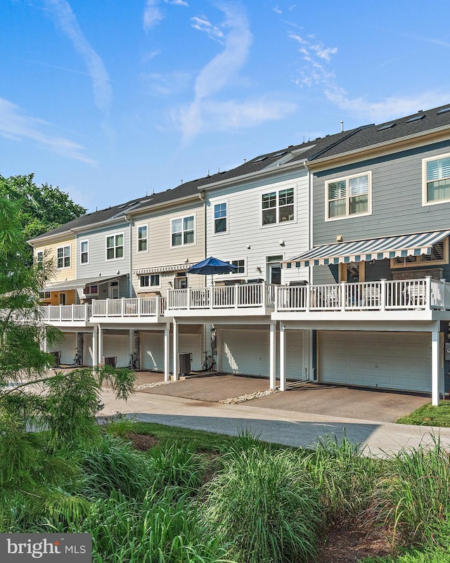 103 Norma Aly, Annapolis, MD 21403 - back of house with an attached garage, driveway, and a deck