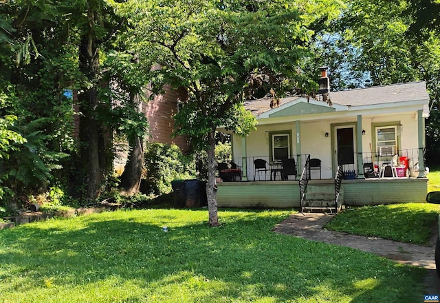 1411 Vine St, Charlottesville, VA 22902 - bungalow with covered porch, a front lawn, and stucco siding