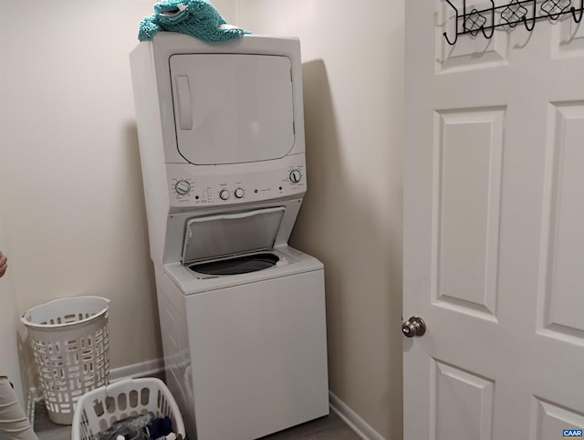 1411 Vine St, Charlottesville, VA 22902 - laundry room featuring stacked washer / dryer and baseboards