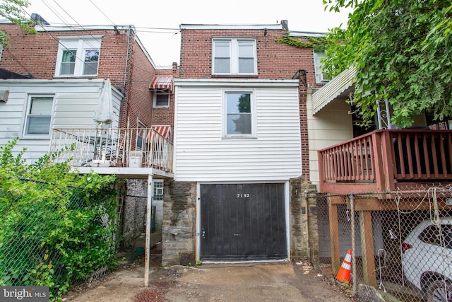 7152 N 20th St, Philadelphia, PA 19138 - back of house featuring a balcony and driveway