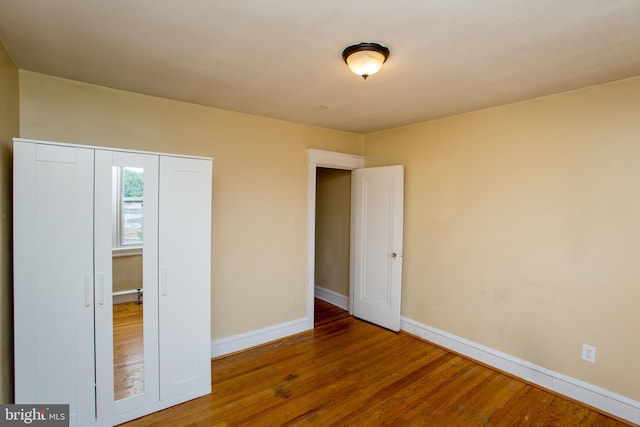 7152 N 20th St, Philadelphia, PA 19138 - unfurnished bedroom featuring wood finished floors and a closet