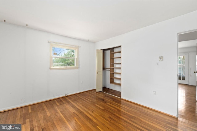 1605 N Amelia St, Sterling, VA 20164 - unfurnished bedroom featuring hardwood / wood-style floors and a closet