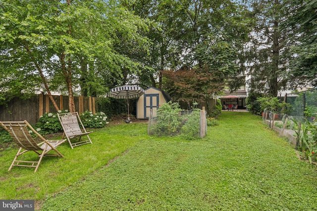 455 Krams Ave, Philadelphia, PA 19128 - fenced backyard featuring a shed and a vegetable garden