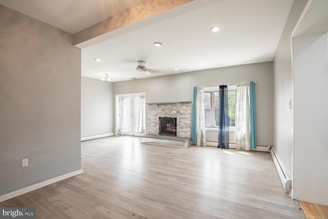 214 Crooked Ln, King Of Prussia, PA 19406 - unfurnished living room featuring a baseboard radiator, a ceiling fan, plenty of natural light, and recessed lighting