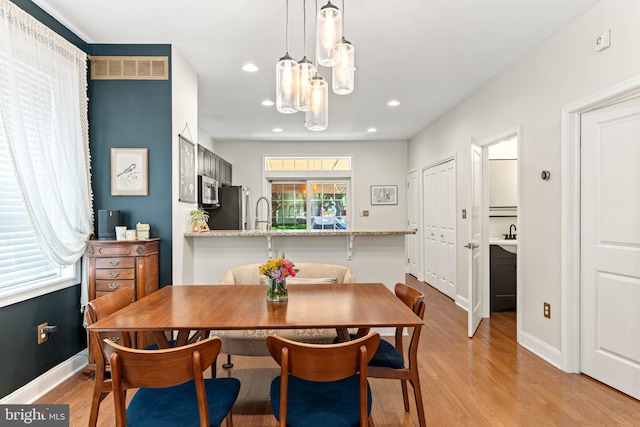 311 W 3rd Ave, Conshohocken, PA 19428 - dining space with light wood-style flooring, recessed lighting, and a chandelier