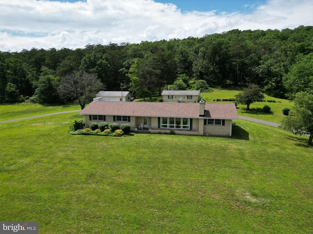 5409 Greenspring Valley Rd, Green Spring, WV 26722 - view of front of home with a view of trees, a front lawn, and a chimney