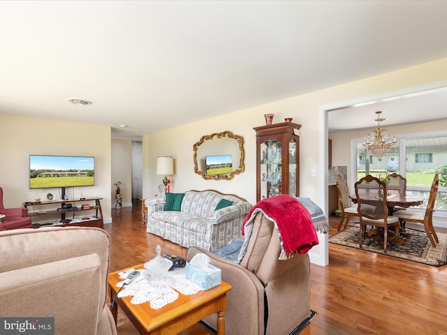 5409 Greenspring Valley Rd, Green Spring, WV 26722 - living area featuring a chandelier and wood finished floors