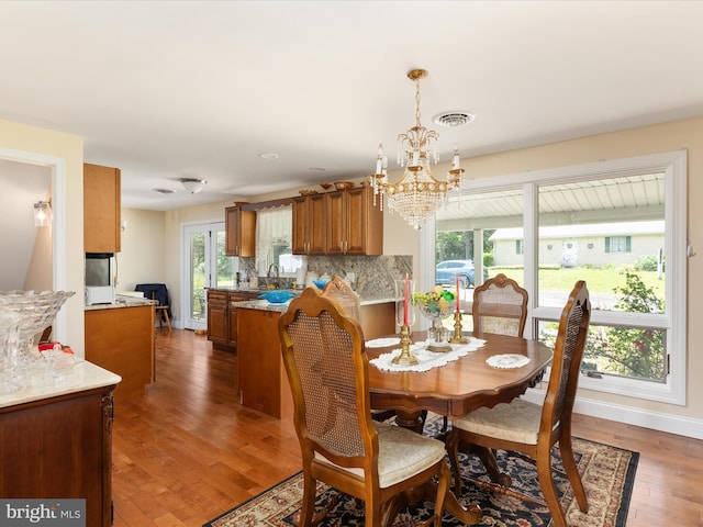 5409 Greenspring Valley Rd, Green Spring, WV 26722 - dining area with a chandelier and wood finished floors