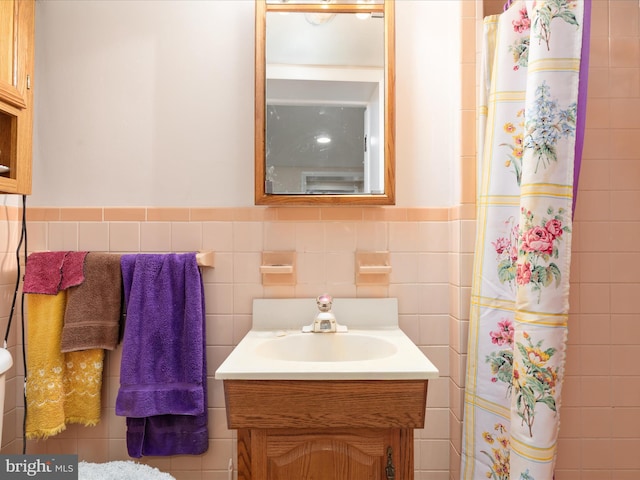 5409 Greenspring Valley Rd, Green Spring, WV 26722 - bathroom with tile walls, vanity, a wainscoted wall, and a shower with shower curtain