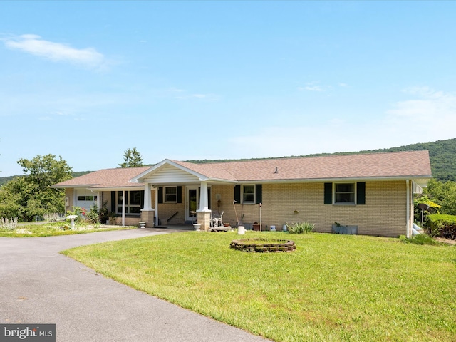 5409 Greenspring Valley Rd, Green Spring, WV 26722 - ranch-style house with a front lawn and brick siding