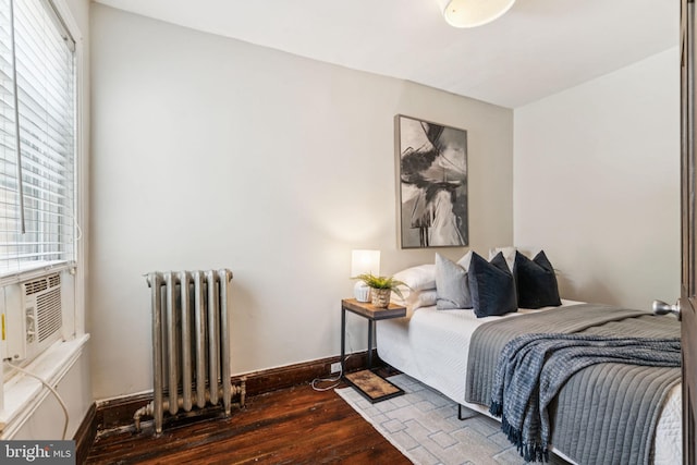 1918 E Albert St, Philadelphia, PA 19125 - bedroom with radiator, hardwood / wood-style flooring, and cooling unit